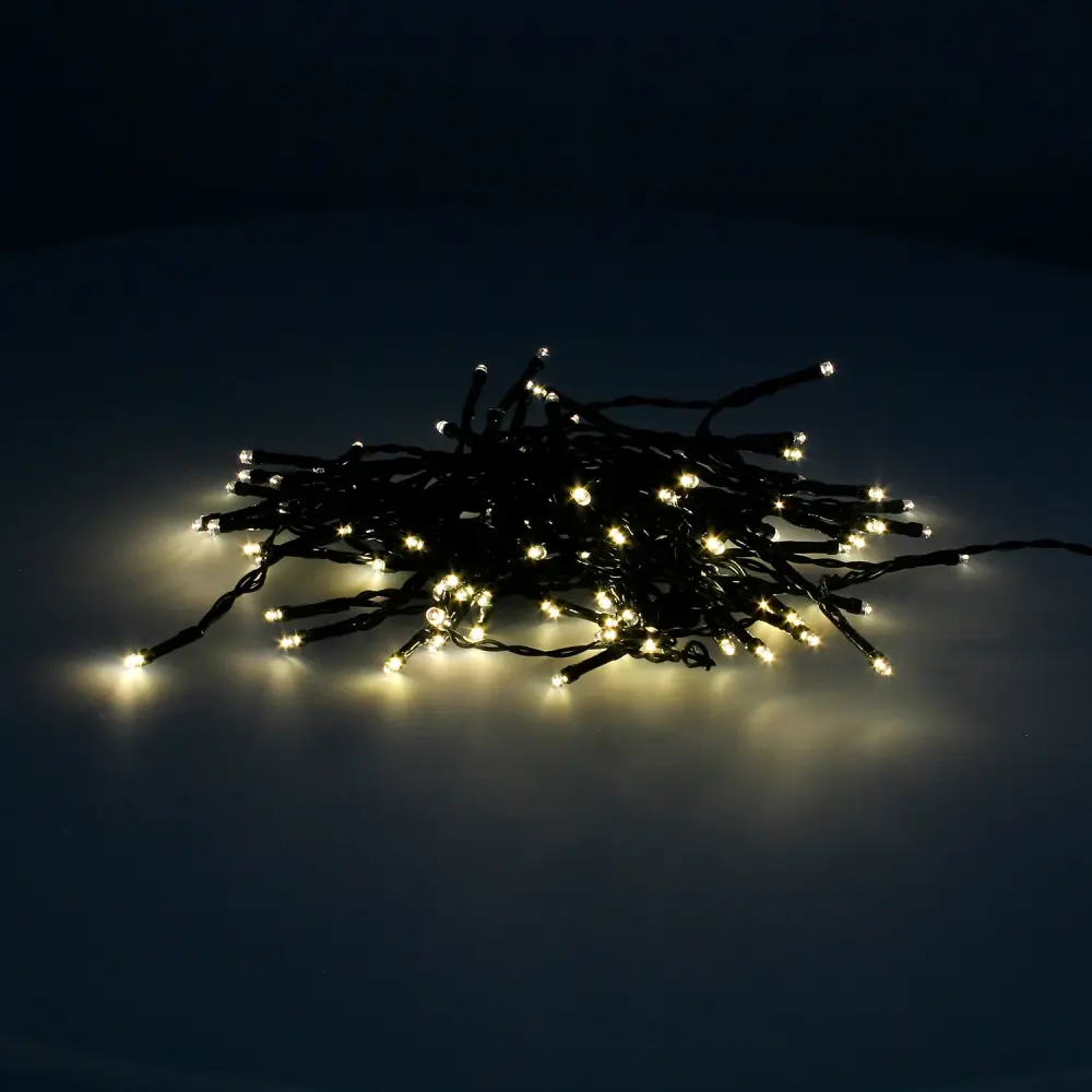 Guinalda Luces Navidad 100 Led Color Blanco Calido.Luz navidad interiores y exteriores IP44.Funciona 3 Baterias AA(No incl...